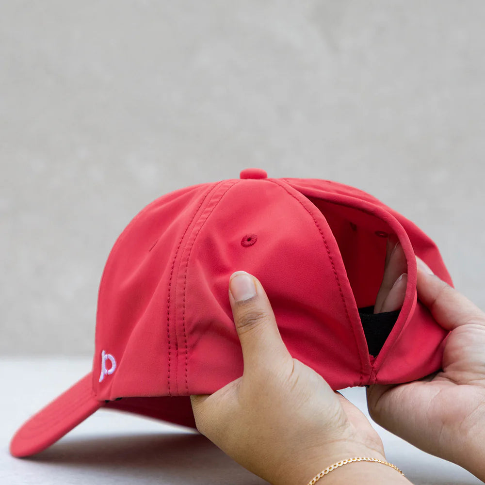 Ponycasquette en rouge